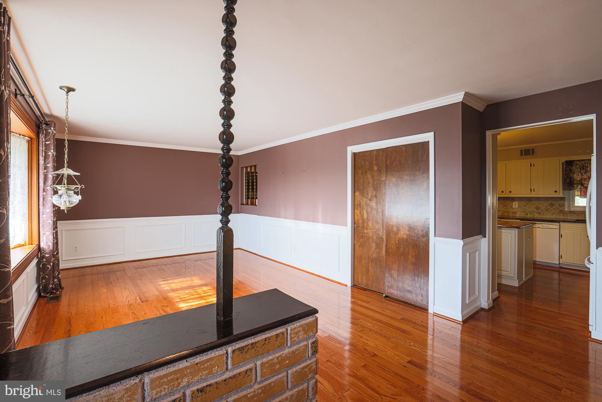 1522 Chivalry Court Rosedale, MD 21237 - Photo 4 of 36 a view of a hallway with a chandelier
