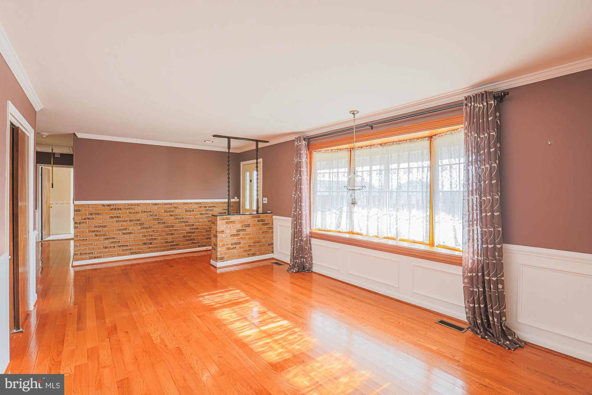 1522 Chivalry Court Rosedale, MD 21237 - Photo 6 of 36 a view of an empty room with a window
