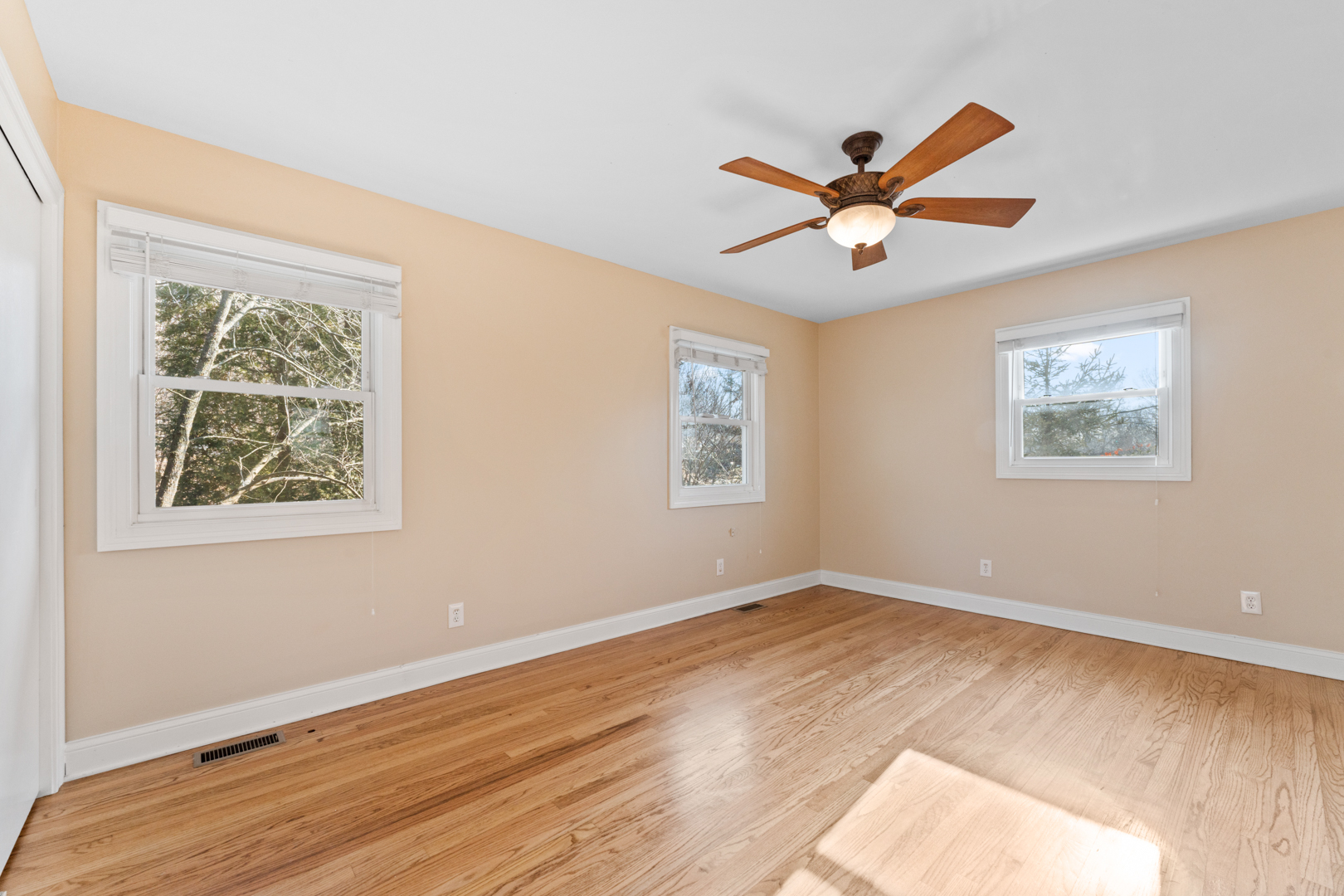 25 5n568 Il Rte Street St. Charles, IL 60174 - Photo 11 of 30 a view of an empty room with window and wooden floor