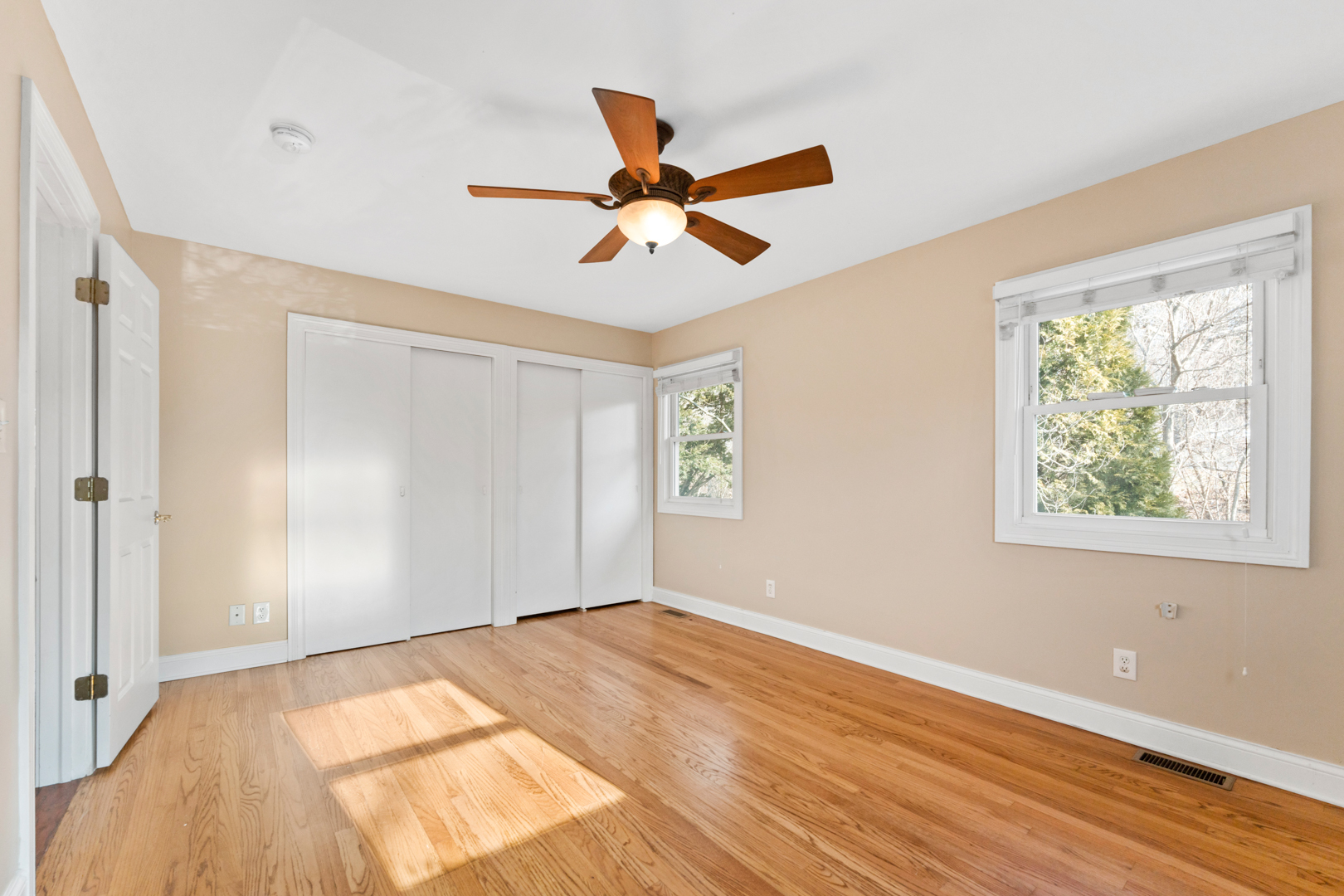 25 5n568 Il Rte Street St. Charles, IL 60174 - Photo 12 of 30 a view of empty room with wooden floor and fan