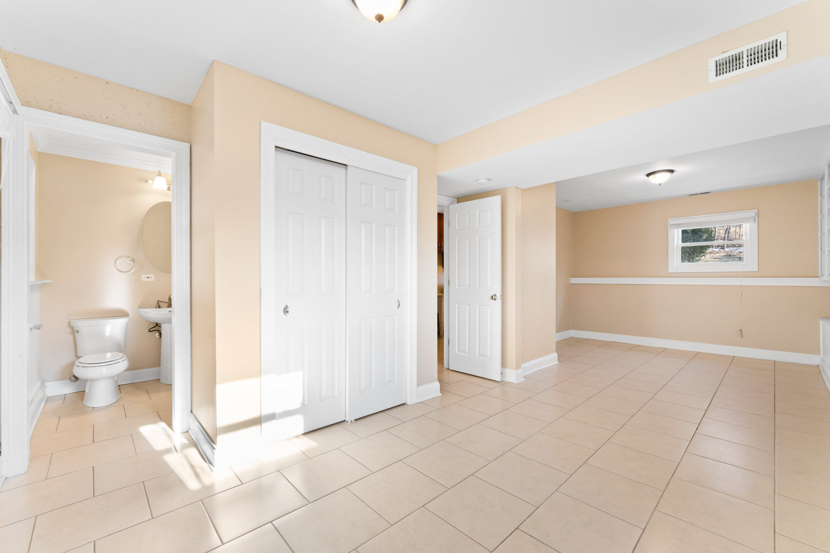 25 5n568 Il Rte Street St. Charles, IL 60174 - Photo 19 of 30 a view of an empty room and a bathroom