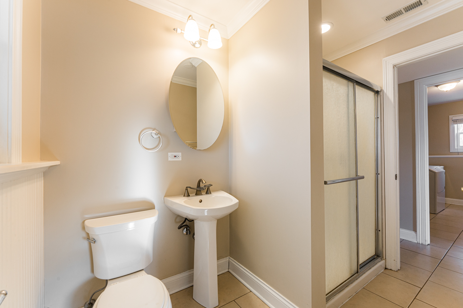 25 5n568 Il Rte Street St. Charles, IL 60174 - Photo 20 of 30 a bathroom with a toilet sink and mirror