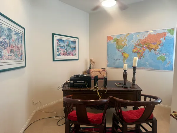 a view of a workspace with furniture