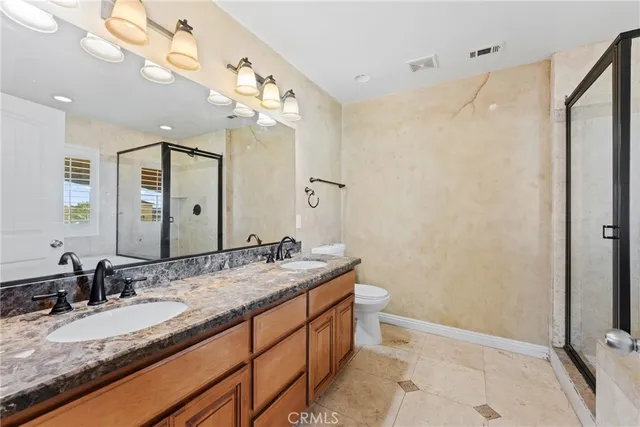 a bathroom with a tub and shower
