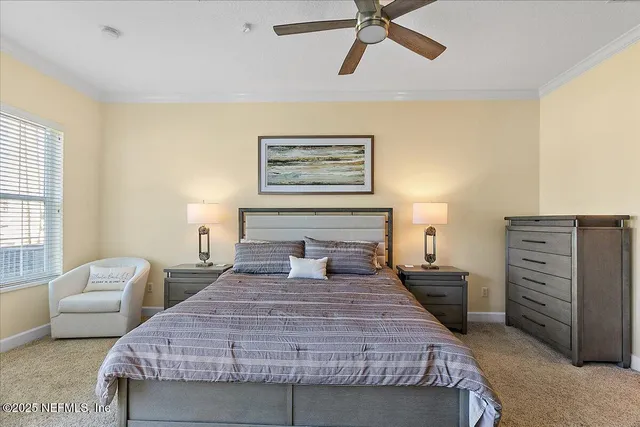 a bedroom with a bed and furniture