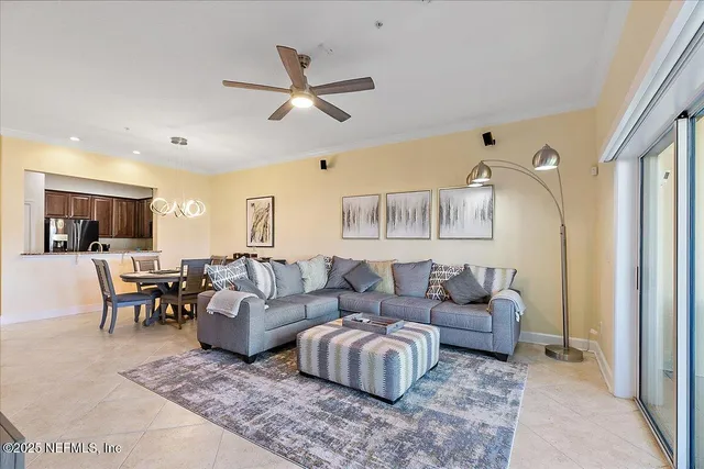a living room with furniture and a rug