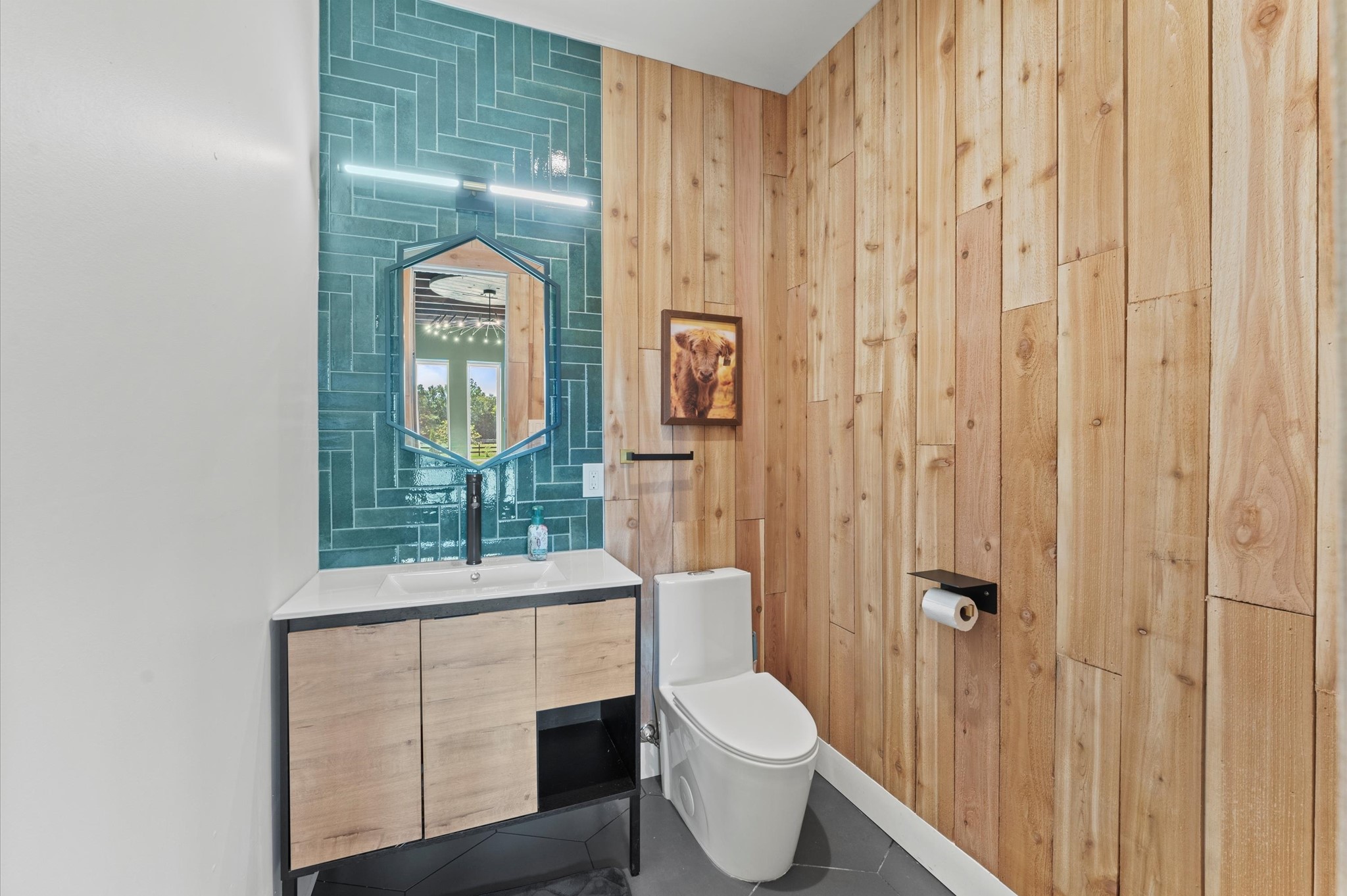 2743 Bobville Road Montgomery, TX 77316 - Photo 13 of 50 a bathroom with a toilet a sink and mirror
