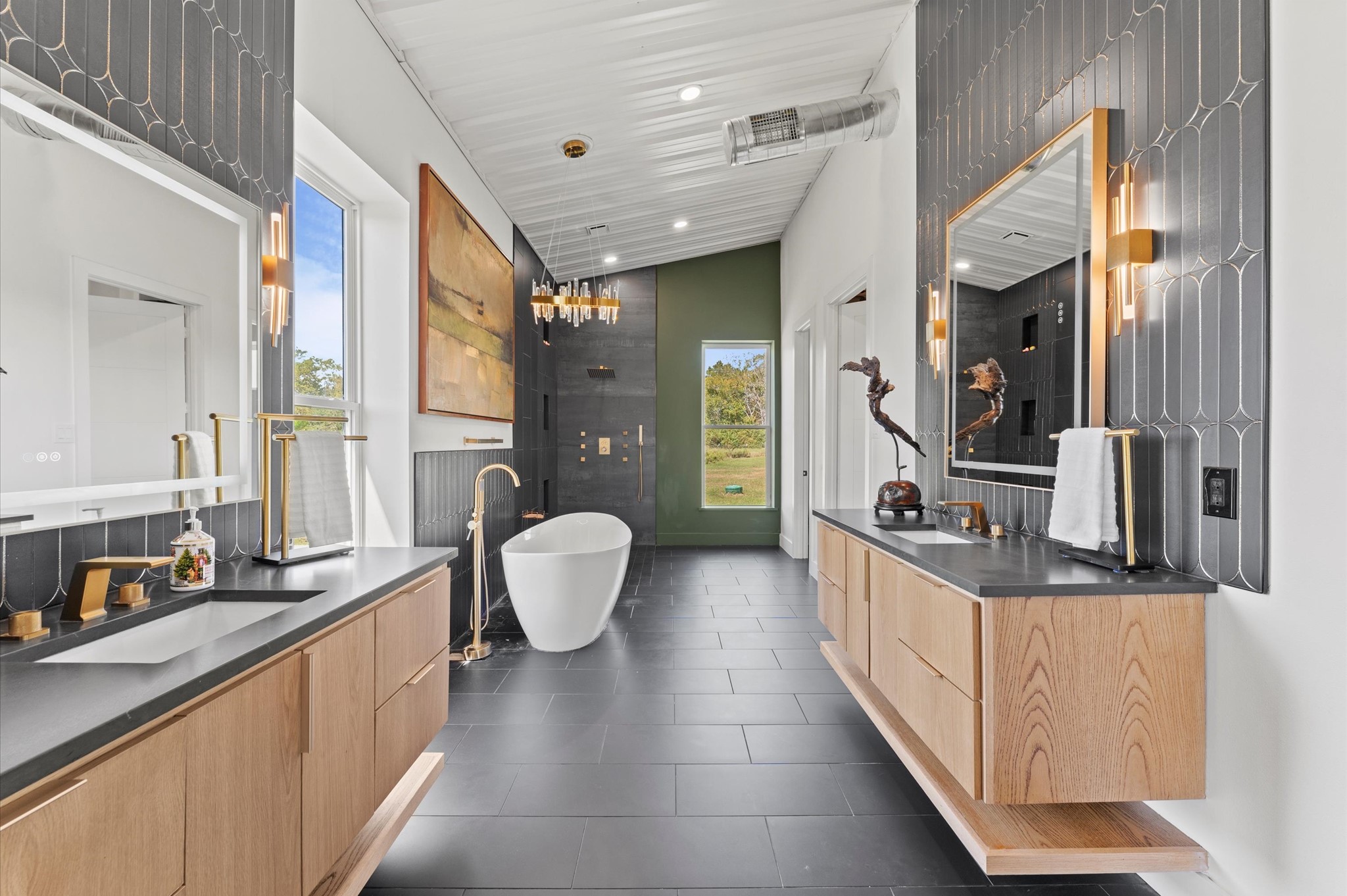 2743 Bobville Road Montgomery, TX 77316 - Photo 16 of 50 a large bathroom with a granite countertop double vanity sink a mirror and shower