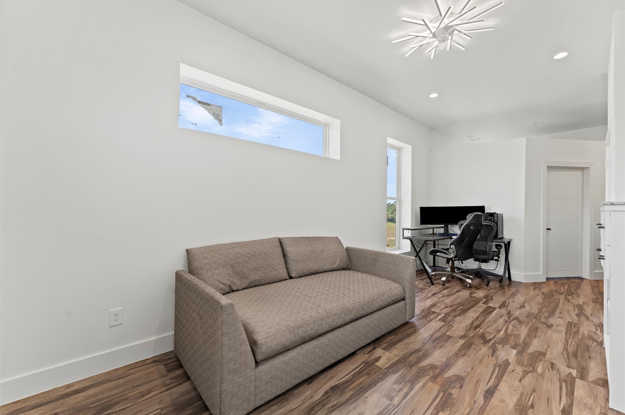 2743 Bobville Road Montgomery, TX 77316 - Photo 27 of 50 a living room with furniture and a rug