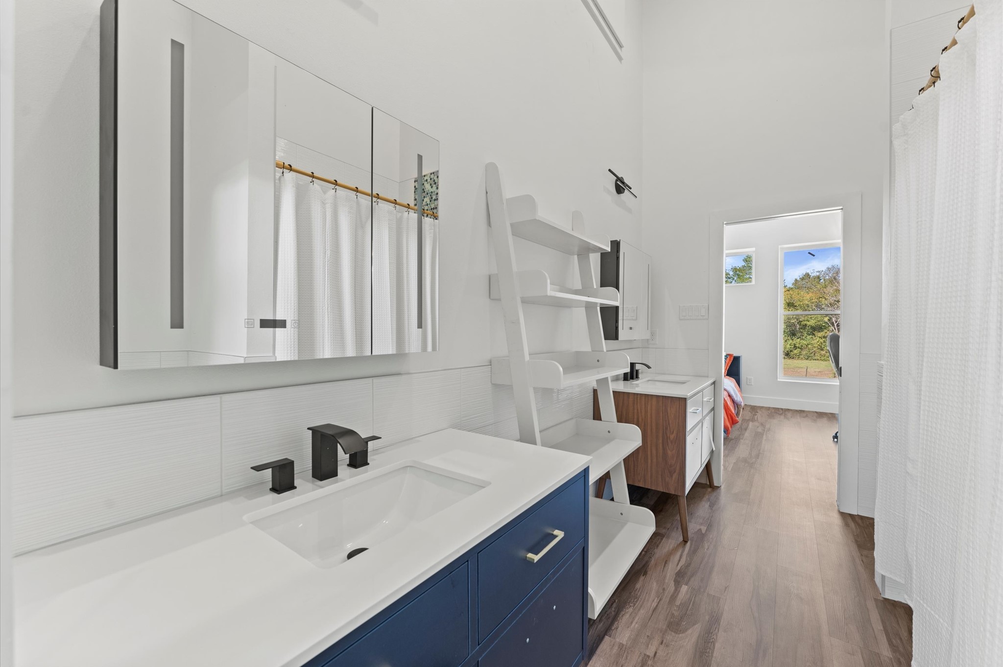 2743 Bobville Road Montgomery, TX 77316 - Photo 36 of 50 a bathroom with a sink and a bathtub
