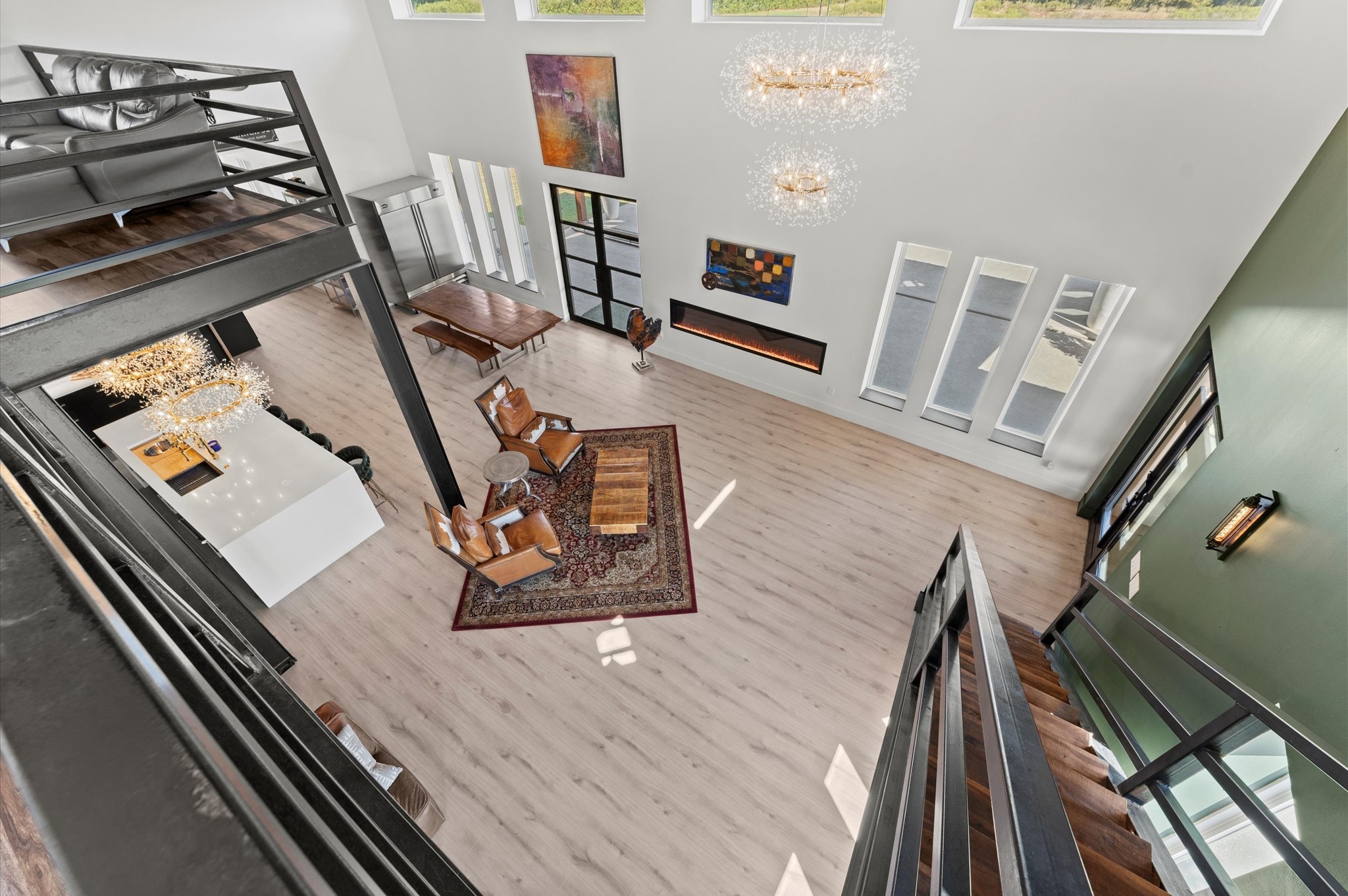 2743 Bobville Road Montgomery, TX 77316 - Photo 38 of 50 a living room with chairs and a wooden floor