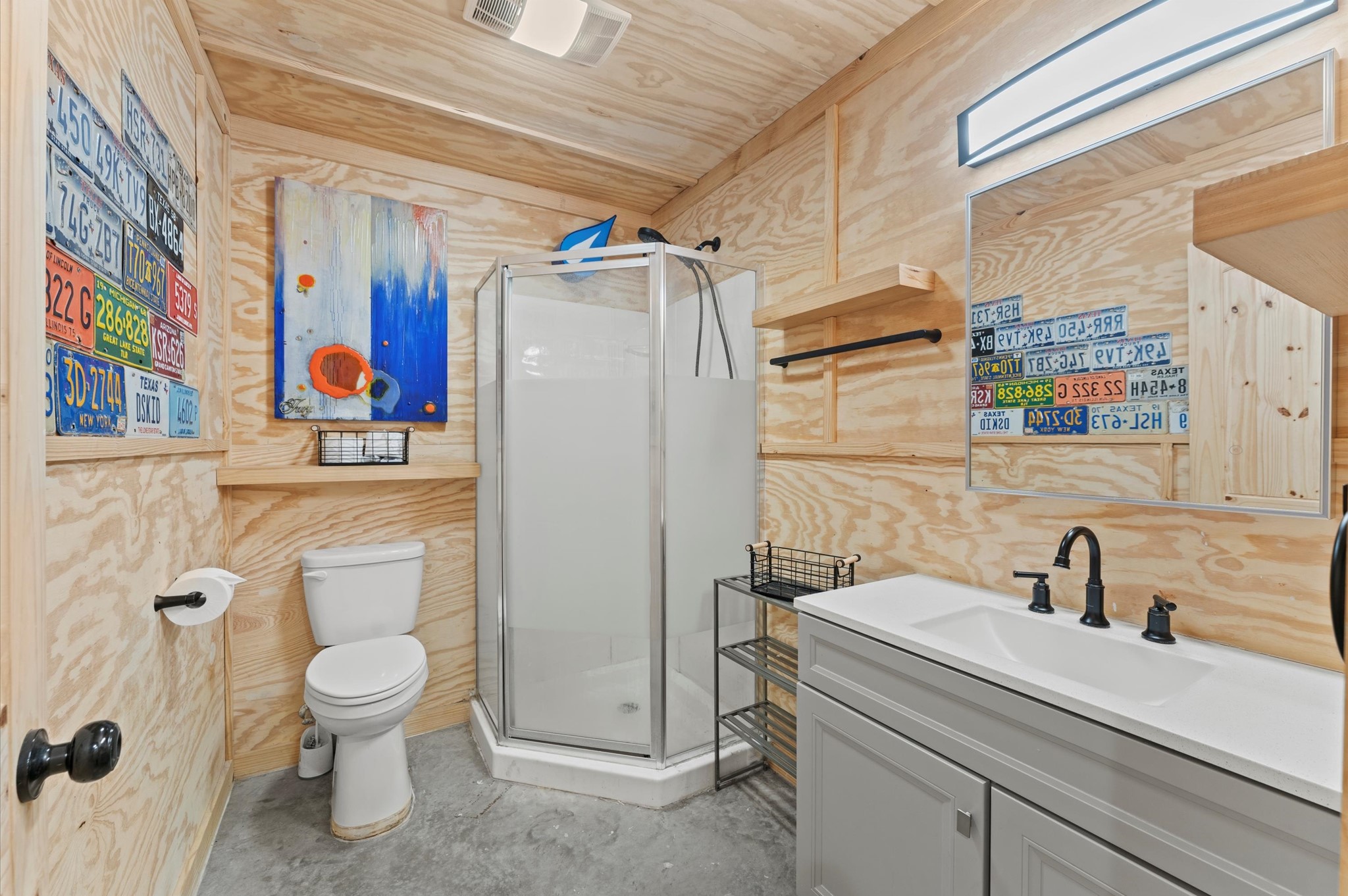 2743 Bobville Road Montgomery, TX 77316 - Photo 42 of 50 a bathroom with a toilet sink and mirror