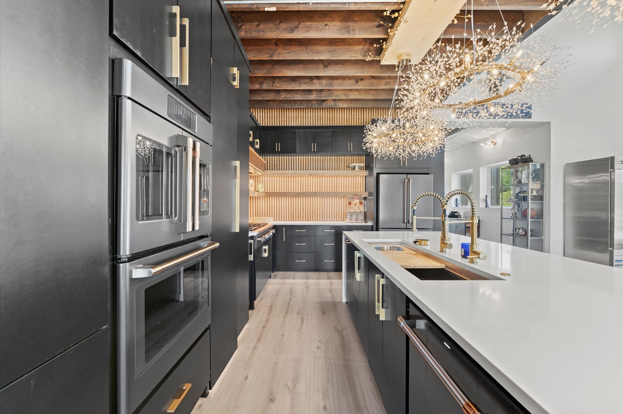 2743 Bobville Road Montgomery, TX 77316 - Photo 10 of 50 a kitchen with a sink stove and refrigerator