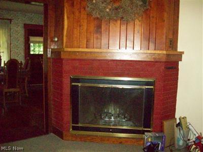 2001 Pontius Road Mogadore, OH 44260 - Photo 10 of 23 Fireplace is in the DR