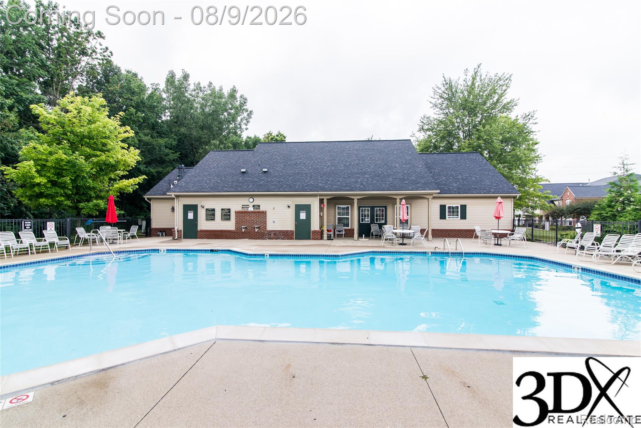 4256 Hampton Ridge Boulevard Howell, MI 48843 - Photo 7 of 26 Expansive outdoor pool with a concrete surround and a fence enclosure