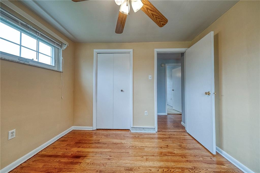 732 Charles Street Rochester, PA 15074 - Photo 31 of 38 a view of an empty room and wooden floor