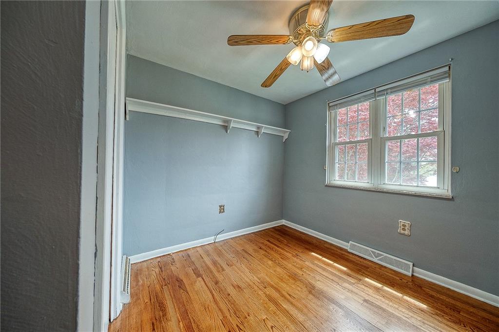 732 Charles Street Rochester, PA 15074 - Photo 33 of 38 a view of a room with a ceiling fan and a window