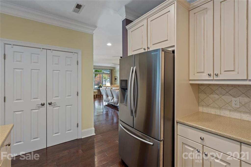 302 Shinnecock Lane Fort Mill, SC 29708 - Photo 19 of 36 a view of a kitchen with refrigerator and cabinet