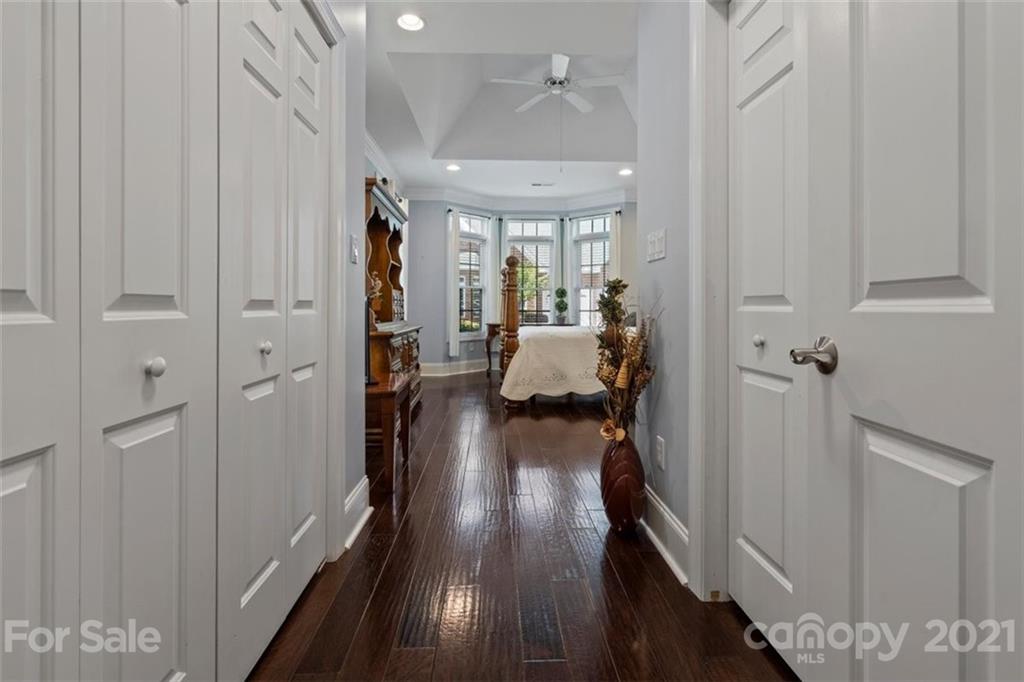 302 Shinnecock Lane Fort Mill, SC 29708 - Photo 20 of 36 a very nice looking room with wooden floor and furniture