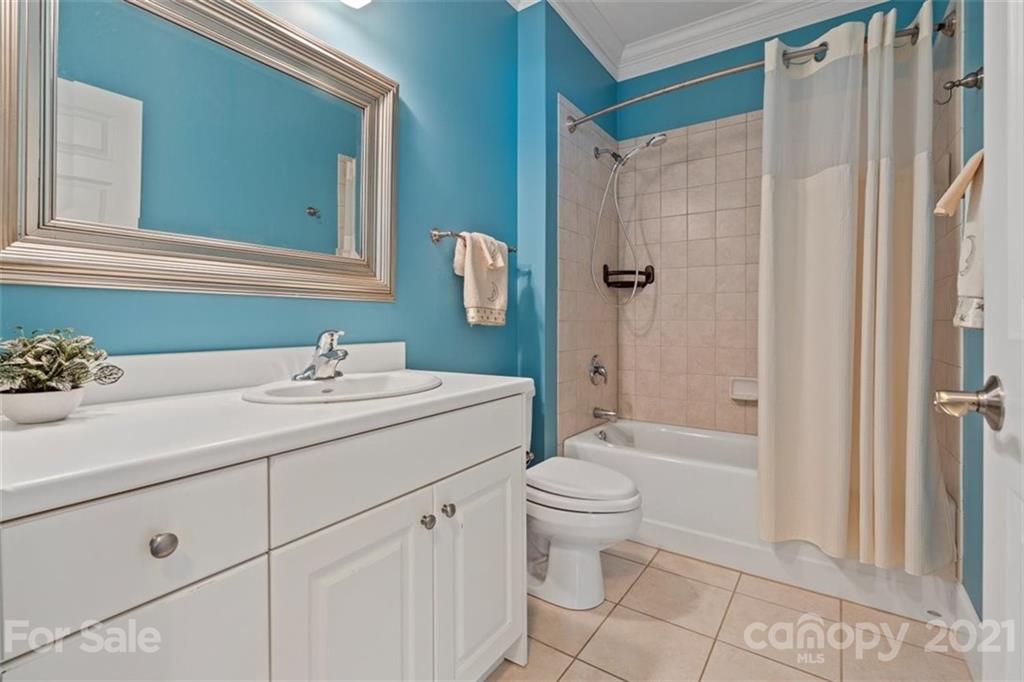 302 Shinnecock Lane Fort Mill, SC 29708 - Photo 24 of 36 a bathroom with a sink toilet and shower