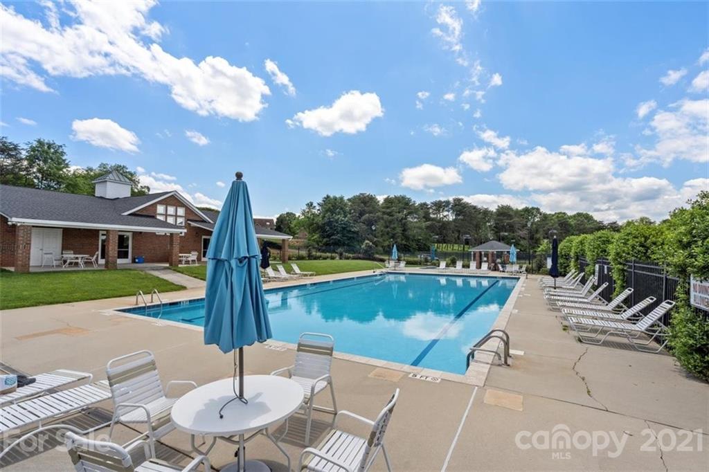 302 Shinnecock Lane Fort Mill, SC 29708 - Photo 35 of 36 a view of a swimming pool with a patio