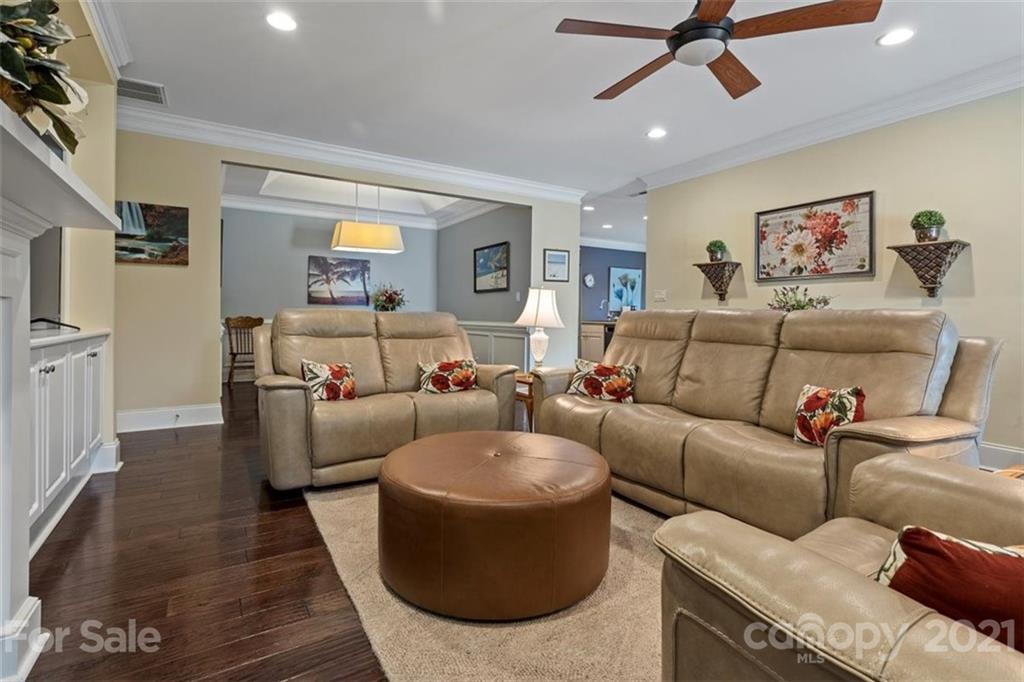 302 Shinnecock Lane Fort Mill, SC 29708 - Photo 10 of 36 a living room with furniture and a wooden floor