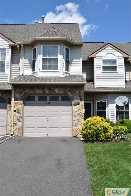 350 Lunar Road Piscataway, NJ 08854 - Photo 1 of 19 a front view of a house with a garden