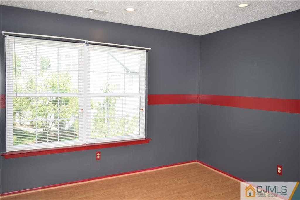 350 Lunar Road Piscataway, NJ 08854 - Photo 11 of 19 a view of an empty room with a window