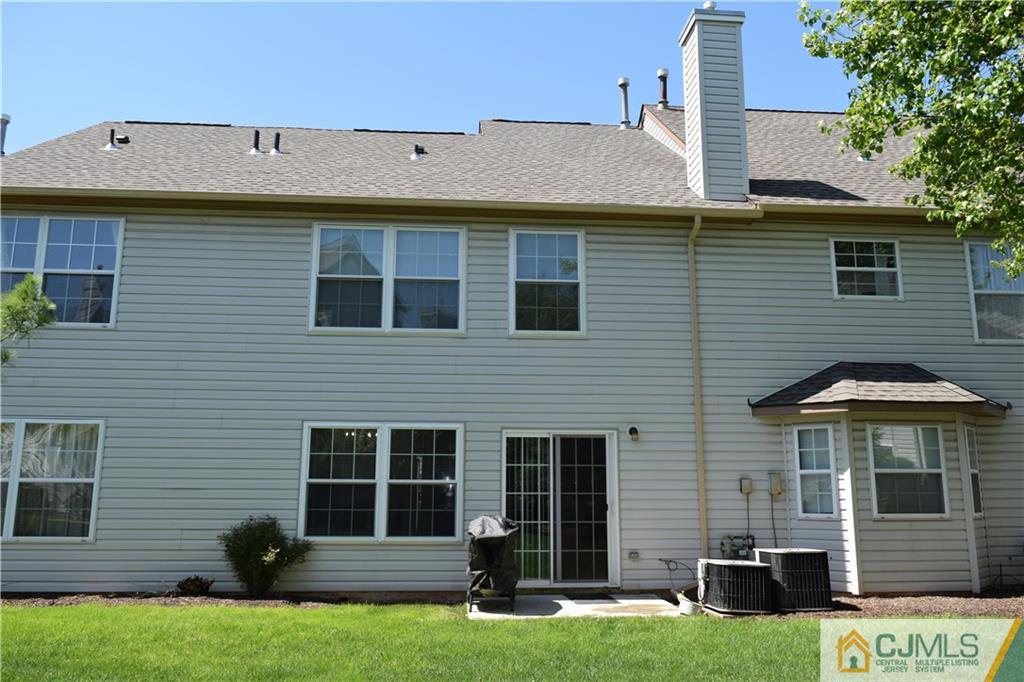 350 Lunar Road Piscataway, NJ 08854 - Photo 15 of 19 a front view of a house with a yard