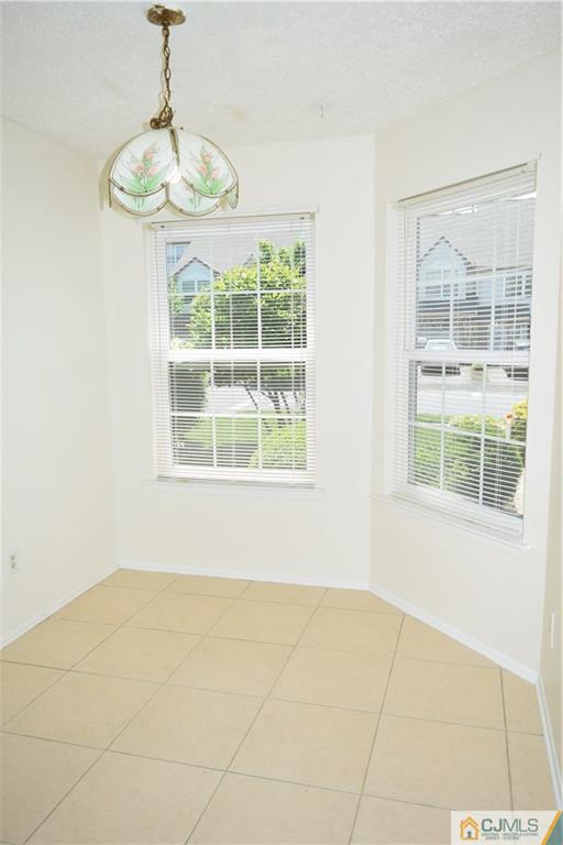350 Lunar Road Piscataway, NJ 08854 - Photo 3 of 19 a view of an empty room with a window