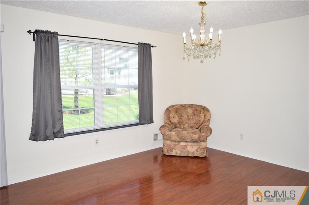 350 Lunar Road Piscataway, NJ 08854 - Photo 5 of 19 a living room with furniture and a large window