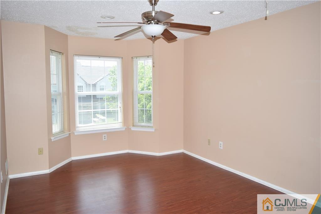 350 Lunar Road Piscataway, NJ 08854 - Photo 6 of 19 wooden floor in an empty room with a window