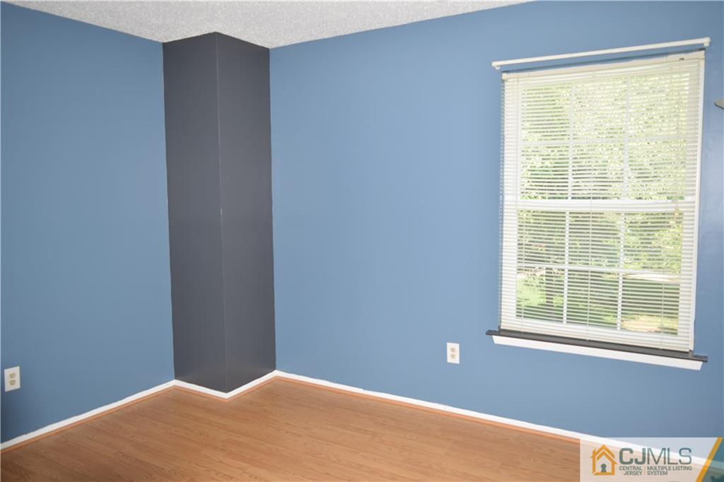 350 Lunar Road Piscataway, NJ 08854 - Photo 10 of 19 a view of a big room with windows
