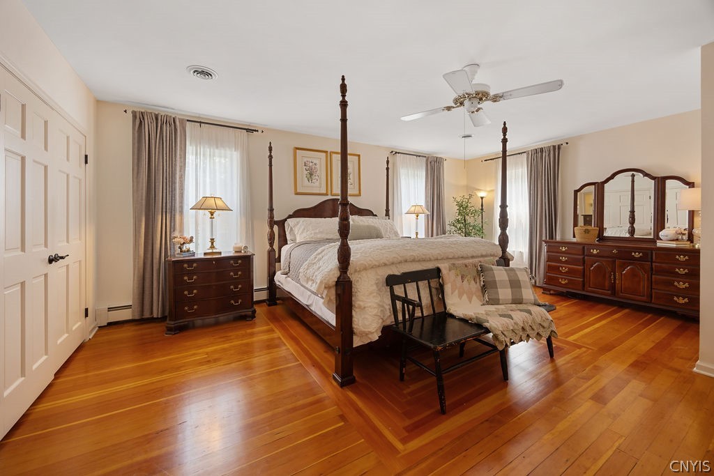 7942 Salt Springs Road Manlius, NY 13104 - Photo 33 of 50 From the main hall of the second floor step down into the primary suite. This suite is large & offers stunning inlay hardwoods.