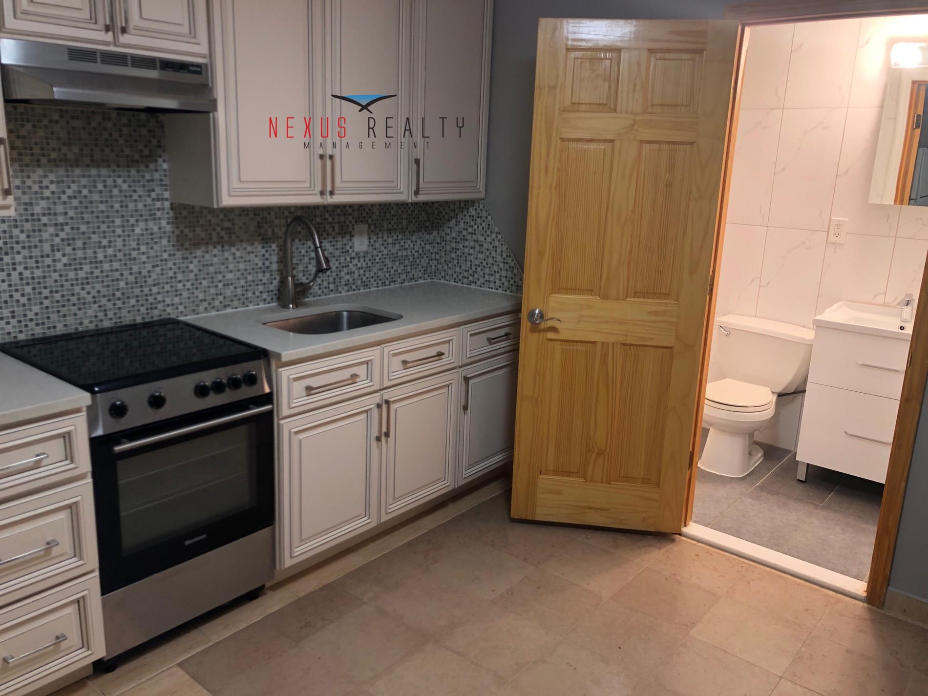 19-22 21st Road, Unit BSMT Queens, NY 11105 - Photo 3 of 10