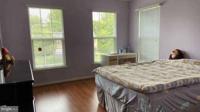 a bathroom with a tub sink and toilet