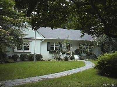 4300 Knob Road Richmond, VA 23235 - Photo 1 of 1 a front view of a house with a garden and plants