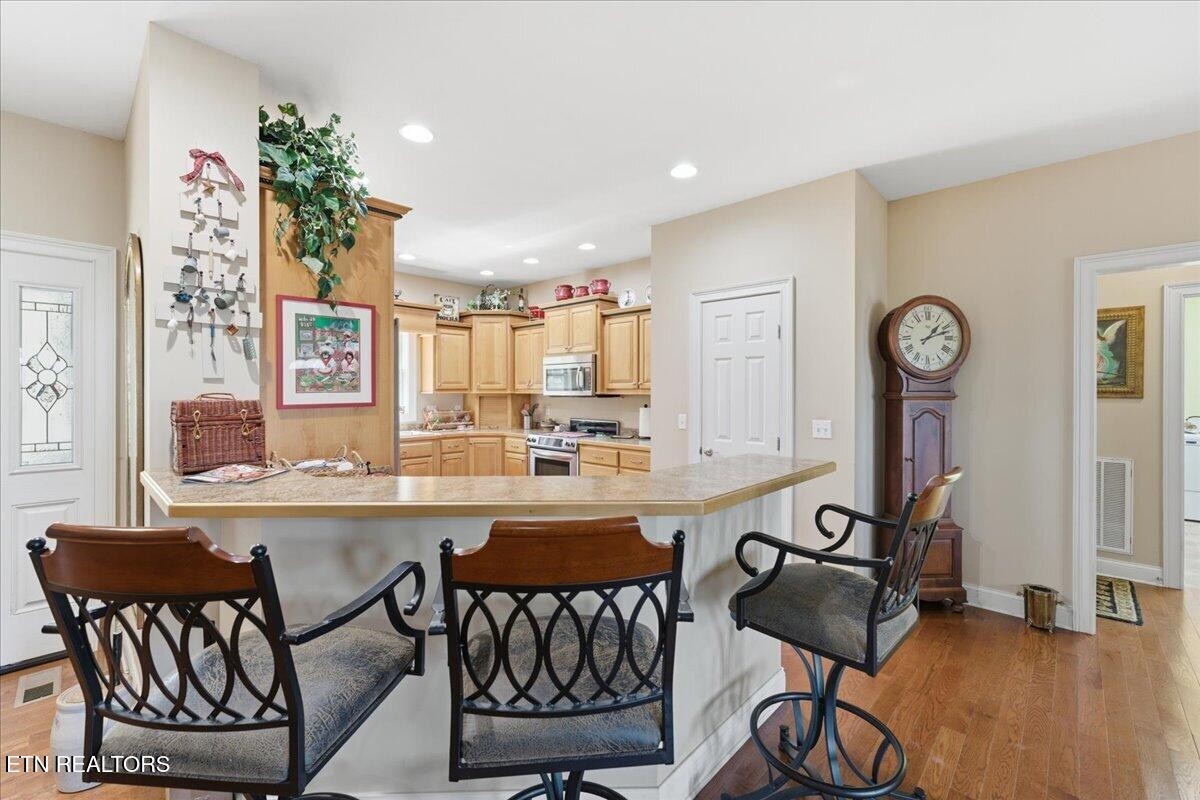 1999 Repass Road New Market, TN 37820 - Photo 14 of 52 a view of a dining room with furniture window and wooden floor