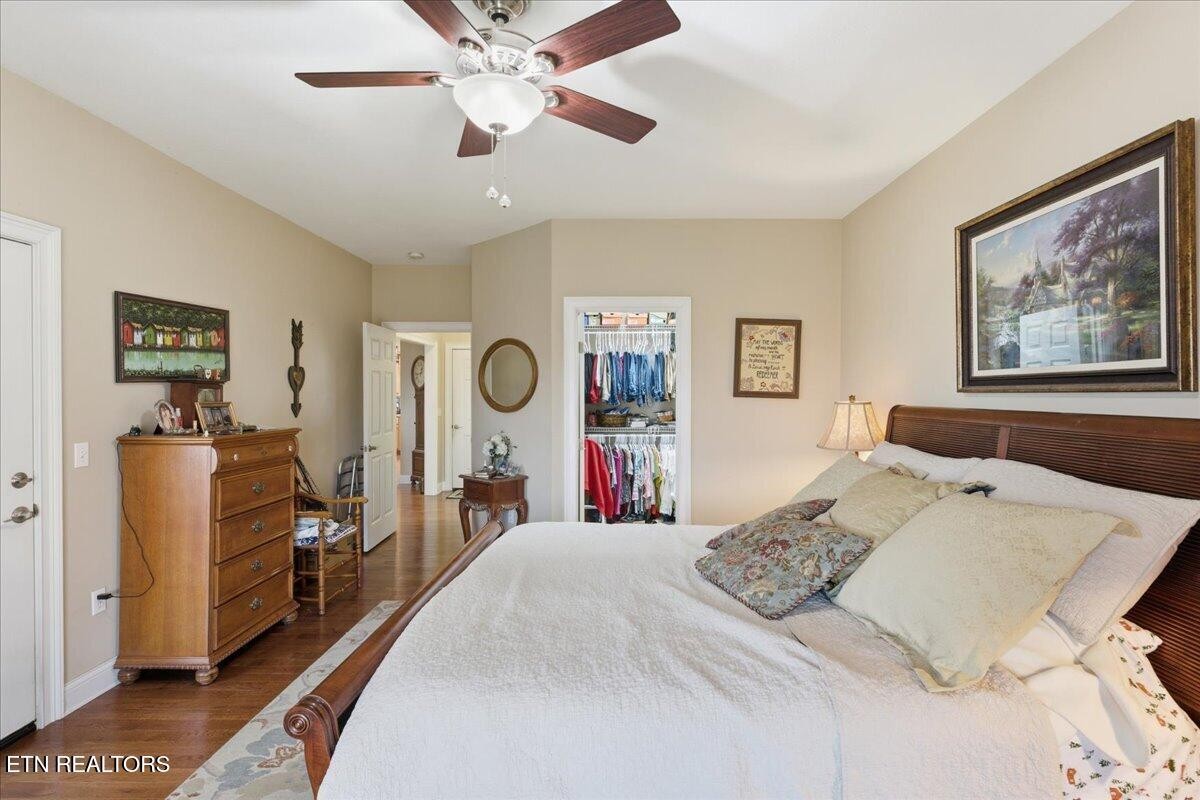 1999 Repass Road New Market, TN 37820 - Photo 19 of 52 a bedroom with a bed and a large mirror