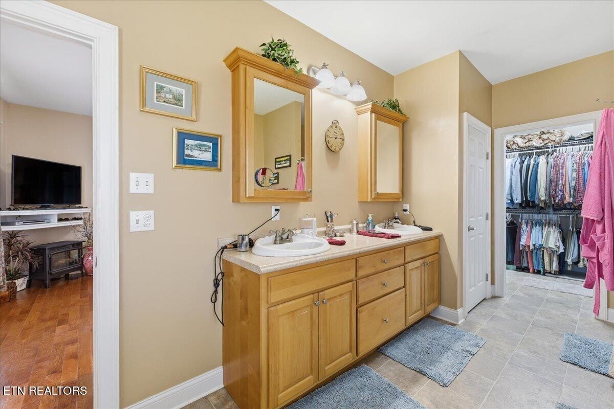 1999 Repass Road New Market, TN 37820 - Photo 20 of 52 a view of bathroom with dual sinks