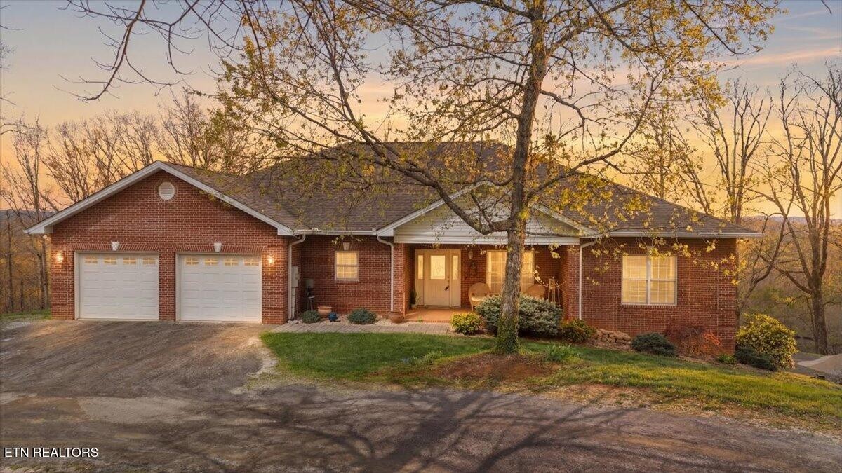 1999 Repass Road New Market, TN 37820 - Photo 2 of 52 front view of house with a yard