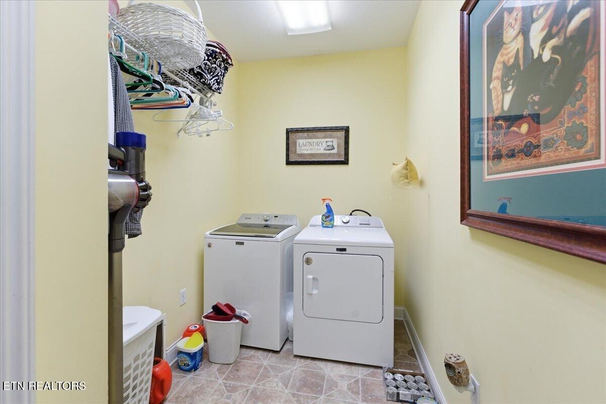 1999 Repass Road New Market, TN 37820 - Photo 24 of 52 a utility room with dryer and washer
