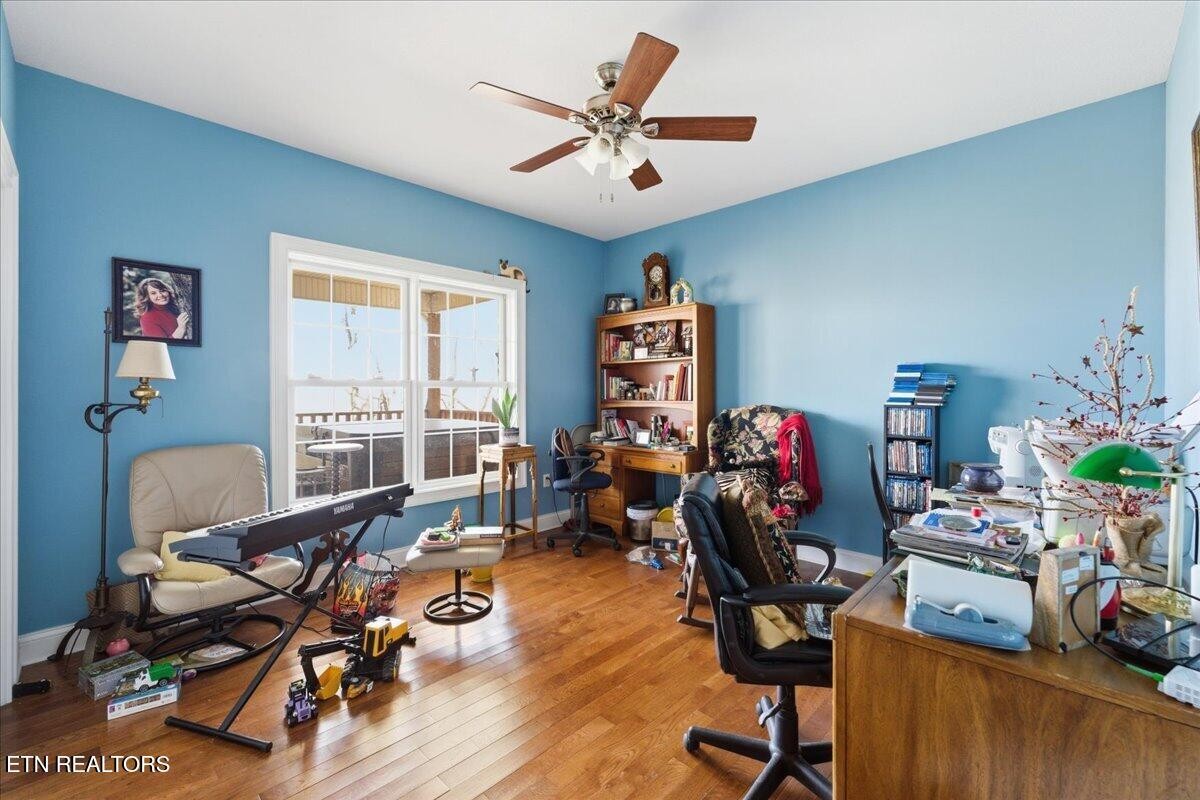 1999 Repass Road New Market, TN 37820 - Photo 27 of 52 a view of a workspace with furniture and a window