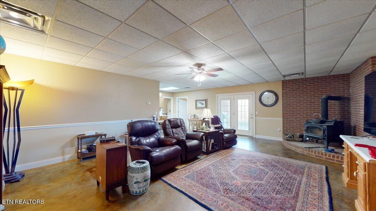 1999 Repass Road New Market, TN 37820 - Photo 29 of 52 a living room with furniture and a flat screen tv