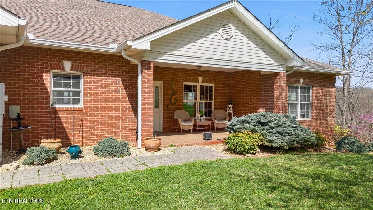 1999 Repass Road New Market, TN 37820 - Photo 3 of 52 front view of a house with a yard