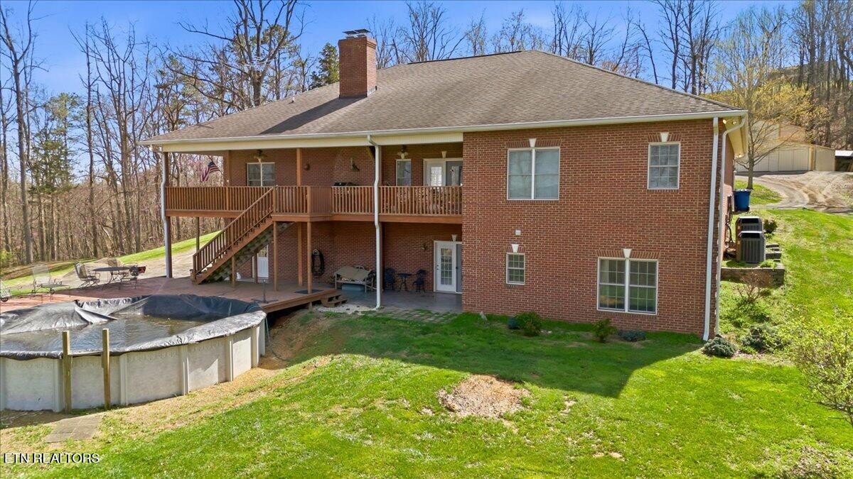 1999 Repass Road New Market, TN 37820 - Photo 50 of 52 a front view of a house with a yard