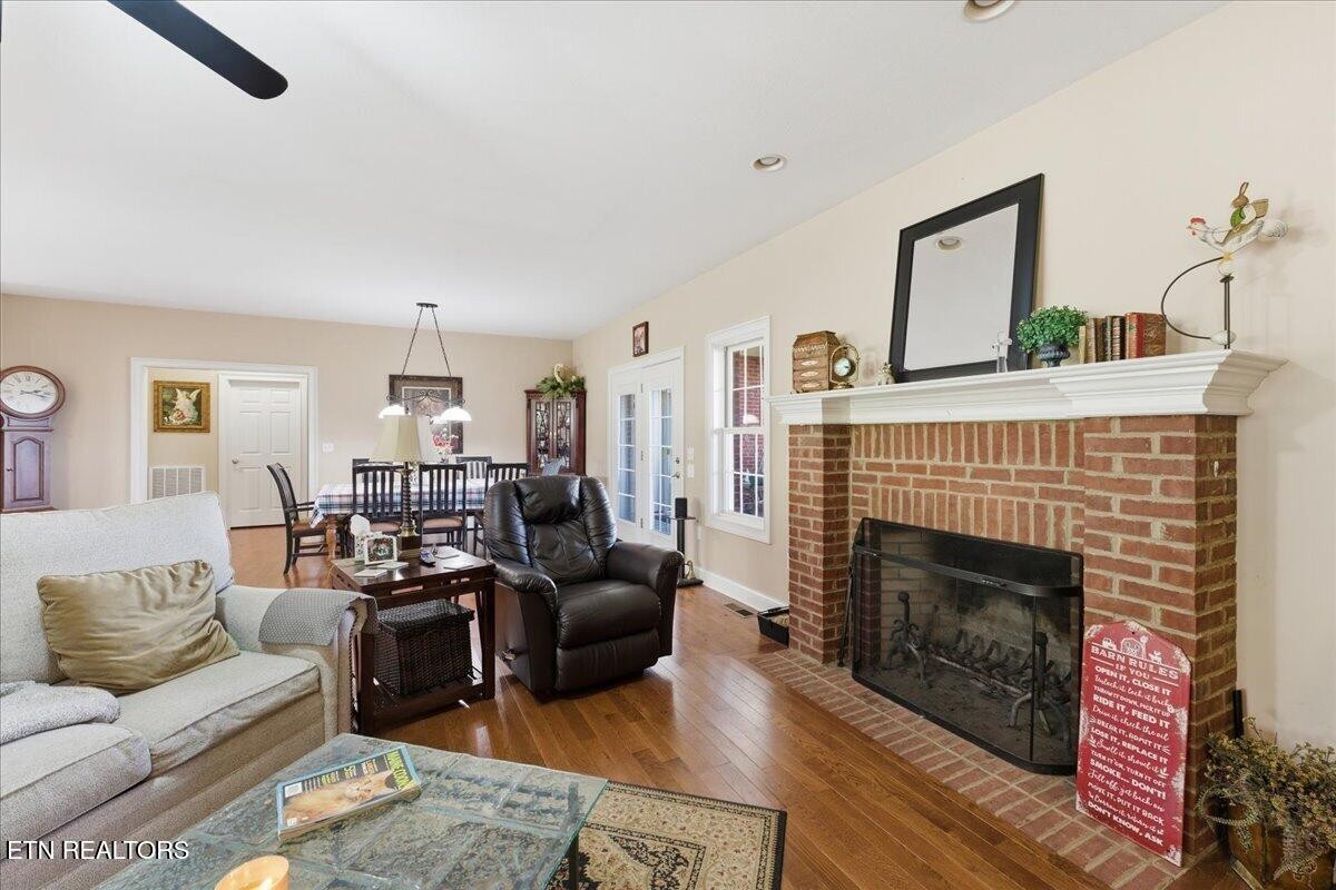 1999 Repass Road New Market, TN 37820 - Photo 8 of 52 a living room with furniture and a fireplace