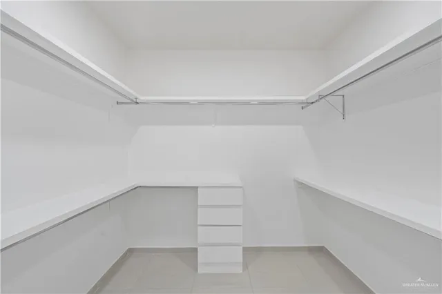 a view of an empty walk in closet
