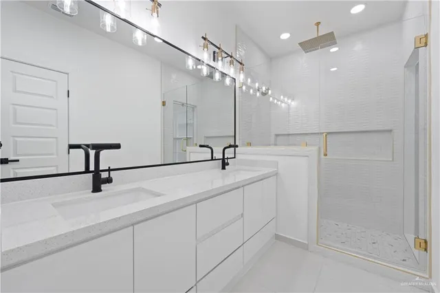 a view of hall way with mirror and window