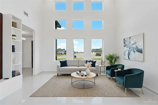 a living room with furniture and a rug